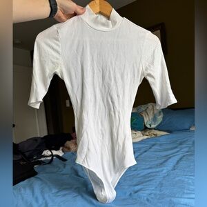 Reformation Ribbed Mock Neck Bodysuit size Small Cream color open back
